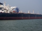 The Liberia-flagged Suezmax tanker Shenlong carrying crude oil berths at the Jawahar Dweep terminal of Mumbai Port in Mumbai. 
