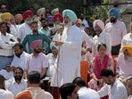 The Congress holding a protest outside the SSP office in Sector 76, Mohali, on Wednesday. (HT) The Congress holding a protest outside the SSP office in Sector 76, Mohali, on Wednesday. (HT)
