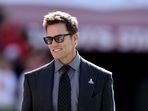 Tom Brady walks on the field during an NFL football game between the Los Angeles Rams and the San Francisco 49ers Tom Brady walks on the field during an NFL football game between the Los Angeles Rams and the San Francisco 49ers