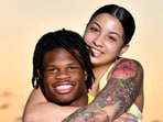 Travis Hunter with his wife, Leanna Lenee. 