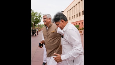 Congress MP Manish Tewari, along with Union minister Gajendra Singh Shekhawat, outside Lok Sabha on Thursday. (PTI) Congress MP Manish Tewari, along with Union minister Gajendra Singh Shekhawat, outside Lok Sabha on Thursday. (PTI)