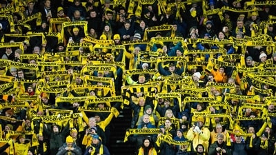 Bodo/Glimt fans display their scarves prior to the UEFA Champions League Round of 16, first-leg match against Sporting CP. (AFP) Bodo/Glimt fans display their scarves prior to the UEFA Champions League Round of 16, first-leg match against Sporting CP. (AFP)