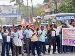 Balurghat: BJP ST Morcha members block a state highway during a protest against the West Bengal government over alleged protocol lapses and disrespect shown towards President Droupadi Murmu during her visit to a tribal conference in North Bengal. (PTI)
