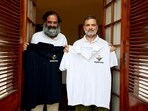 Brijendra Singh unveils yatra T-shirt during a meeting with Congress leader Rahul Gandhi in New Delhi on Friday. (HT Photo) Brijendra Singh unveils yatra T-shirt during a meeting with Congress leader Rahul Gandhi in New Delhi on Friday. (HT Photo)