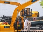 CM Rekha Gupta and water minister Parvesh Kumar at the launch of the machines at Najafgarh drain. (Vipin Kumar/HT Photo)