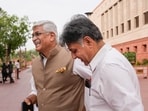 Congress MP Manish Tewari, along with Union minister Gajendra Singh Shekhawat, outside Lok Sabha on Thursday. (PTI)