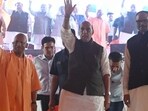 Defence minister Rajnath Singh, UP CM Yogi Adityanath, his deputy Brajesh Pathak and others at an event in Lucknow. (HT photo)
