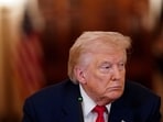 US President Donald Trump looks on during a round table on collegiate sports in the White House in Washington, DC. (Reuters)
