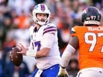 Buffalo Bills quarterback Josh Allen (17) looks for a receiver during the first half of an NFL divisional round playoff Buffalo Bills quarterback Josh Allen (17) looks for a receiver during the first half of an NFL divisional round playoff