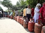 Residents queue up for LPG refills outside a gas agency at Ram Darbar, Chandigarh, on Thursday. (Keshav Singh/HT)