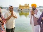 Arvind Kejriwal and Bhagwant Singh Mann during their visit to Sri Harmandir Sahib in Amritsar on Thursday. The visit came after the trial court discharge in the excise policy case, with related proceedings continuing in the Delhi High Court.