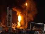 Fire at LyondellBasell Pasadena plant as flames can be seen from a distance. 