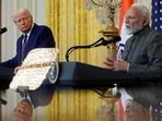 PM Modi (R) and US President Donald Trump seen together.