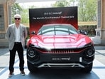 Ajith Kumar poses with his swanky new Mahindra BE 6 Formula E car. Ajith Kumar poses with his swanky new Mahindra BE 6 Formula E car.