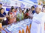 Bihar CM Nitish Kumar visits stalls run by women during his Samriddhi Yatra in Begusarai on Saturday. (HT Photo)