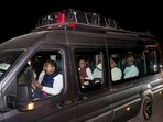 Congress MLAs arrive at a hotel ahead of the polling for two Rajya Sabha seats in Haryana, near Kufri in Shimla, on Friday. (PTI)