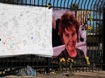A photograph of Nancy Guthrie is seen on a sign that people can leave messages on February 26, 2026, in Tucson