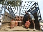 Temporary distribution points have been set up in colonies, where consumers are being provided cylinders based on their booking slips. (HT FILE )