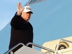U.S. President Donald Trump waves as he boards Air Force One for travel to Florida, at Joint Base Andrews, Maryland, U.S., March 13, 2026. REUTERS/Kevin Lamarque