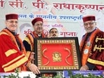 Vice-President CP Radhakrishnan being welcomed by governor Kavinder Gupta during the ninth convocation of the Central University of Himachal Pradesh in Dharamshala, Kangra, on Saturday. (HT Photo)