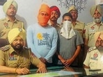 Accused of extortion bid in the custody of Sudhar Police in Ludhiana on Sunday. (HT Photo) Accused of extortion bid in the custody of Sudhar Police in Ludhiana on Sunday. (HT Photo)