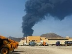 Dubai Abu Dhabi news highlights: Smoke rises in the Fujairah oil industry zone, caused by debris after interception of a drone by air defences, according to the Fujairah media office, amid the U.S.-Israel conflict with Iran, in Fujairah, United Arab Emirates, March 14, 2026. 