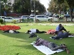 People take a nap and rest during the afternoon amid pleasant weather at Mandi House in New Delhi on Saturday. (Arvind Yadav/HT photo) People take a nap and rest during the afternoon amid pleasant weather at Mandi House in New Delhi on Saturday. (Arvind Yadav/HT photo)