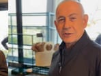 Israeli PM Netanyahu releases a video to debunk rumors of his death, humorously ordering coffee and praising national resilience. 