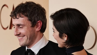 Paul Mescal and Gracie Abrams pose on the red carpet. (REUTERS)