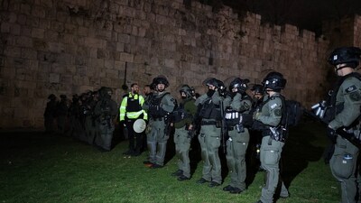 Members of Israeli security forces stand guard, as Muslim Palestinian worshippers mark Laylat al-Qadr during the Muslim holy fasting month of Ramadan, outside the Old City of Jerusalem, as prayers at Al-Aqsa compound are restricted, amid the U.S.-Israeli conflict with Iran, in Jerusalem, March 15, 2026. (REUTERS)