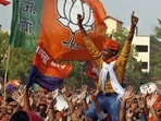 BJP supporters at a rally in Varanasi. (HT Photo)
