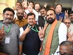 Bihar Deputy CM Samrat Choudhary, BJP Rajya Sabha candidates Nitin Nabin and Shivesh Ram and party MLAs flash victory sign after casting votes during the Rajya Sabha election at the Bihar Assembly in Patna on Monday. (Santosh Kumar/ht)