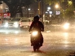 Commuters caught in the rain in Sector 22, Chandigarh, on Sunday night. (Keshav Singh/HT) Commuters caught in the rain in Sector 22, Chandigarh, on Sunday night. (Keshav Singh/HT)