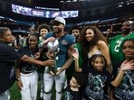 Darius Slay celebrates with Vince Lombardi Trophy and his family after beating the Kansas City Chiefs 40-22 to win Super Bowl LIX