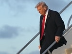 Donald Trump disembarks from Air Force One upon arrival at Miami International Airport in Miami, Florida
