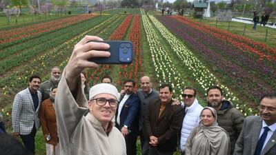 Jammu and Kashmir chief minister Omar Abdullah taking a selfie along with his cabinet colleagues after throwing open the Tulip Garden in Srinagar on Monday. (Waseem Andrabi/HT) Jammu and Kashmir chief minister Omar Abdullah taking a selfie along with his cabinet colleagues after throwing open the Tulip Garden in Srinagar on Monday. (Waseem Andrabi/HT)
