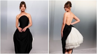 Mia Goth channeled understated luxury in a Dior gown featuring a minimalist black strapless bodice, paired with a dramatic voluminous skirt, revealing layers of frothy white tulle at the back. (REUTERS) Mia Goth channeled understated luxury in a Dior gown featuring a minimalist black strapless bodice, paired with a dramatic voluminous skirt, revealing layers of frothy white tulle at the back. (REUTERS)