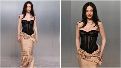 Mikey Madison hit the Vanity Fair carpet in stunning gown, featuring a striking black sheer corset-style bodice with structured boning, paired with a champagne satin skirt draped low on the hips and finished with soft ruching and a fishtail hem. (REUTERS) Mikey Madison hit the Vanity Fair carpet in stunning gown, featuring a striking black sheer corset-style bodice with structured boning, paired with a champagne satin skirt draped low on the hips and finished with soft ruching and a fishtail hem. (REUTERS)