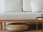 A plush 3 seater sofa placed in a warm living room, inviting comfort, soft textures and relaxed evenings at home.(Pexels.com)