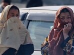 Pakistan-Afghanistan 'war' highlights: Two women watch as rescue workers and officials inspect the site of a late-Monday airstrike at a drug rehabilitation hospital in Kabul, Afghanistan, Tuesday, March 17, 2026.