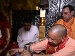 Chief minister Yogi Adityanath offers prayers at the Maa Vindhyavasini temple in Mirzapur on Tuesday. (HT)
