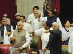 Haryana Congress members, including CLP leader Bhupinder Singh Hooda and former Speaker Raghuvir Singh Kadian leading the party’s charge in the assembly on Tuesday. (Keshav Singh/HT) Haryana Congress members, including CLP leader Bhupinder Singh Hooda and former Speaker Raghuvir Singh Kadian leading the party’s charge in the assembly on Tuesday. (Keshav Singh/HT)
