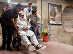 Haryana minister Anil Vij arrives in a wheelchair to cast his vote in the Rajya Sabha elections in Chandigarh on Monday. (PTI)