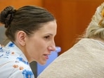 Defendant Kouri Richins, left, accused of poisoning her husband in March 2022, listens to closing arguments in Third District Court, Monday, March 16, 2026, in Park City, Utah. (David Jackson/Pool Photo via AP)