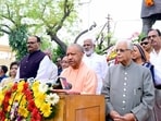 UP CM Yogi Adityanath, dy CM Brajesh Pathak and others paying tribute to HN Bahuguna on his death anniversary. (HT photo)