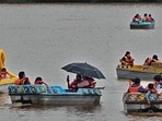 Visitors enjoying cloudy weather at Sukhna Lake in Chandigarh on Sunday. (HT) Visitors enjoying cloudy weather at Sukhna Lake in Chandigarh on Sunday. (HT)