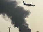 A smoke plume near the Dubai International Airport. (AFP)