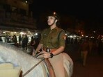 A woman police officer patrols on horseback during a night deployment, symbolising the growing strength, visibility and leadership of women in uniform across Uttar Pradesh Police. (File photo)