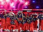 RCB players celebrate their first men's IPL title.