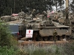 Israeli military vehicles on the Israeli side of the border with Lebanon, amid escalation between Iran-backed Hezbollah and Israel